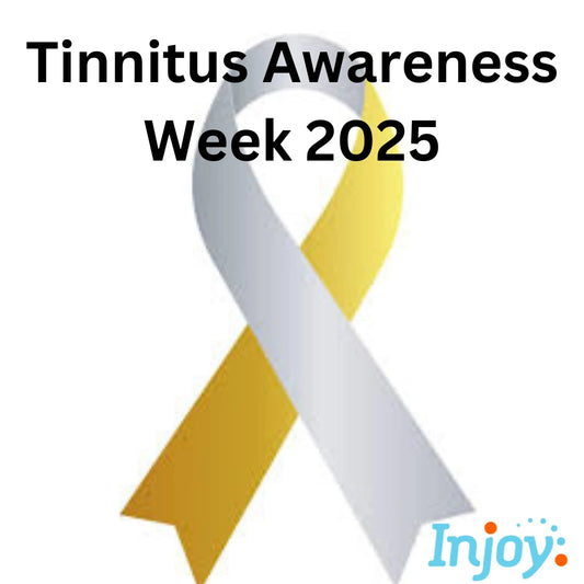 The gold and silver tinnitus awareness ribbon sits on a white background.