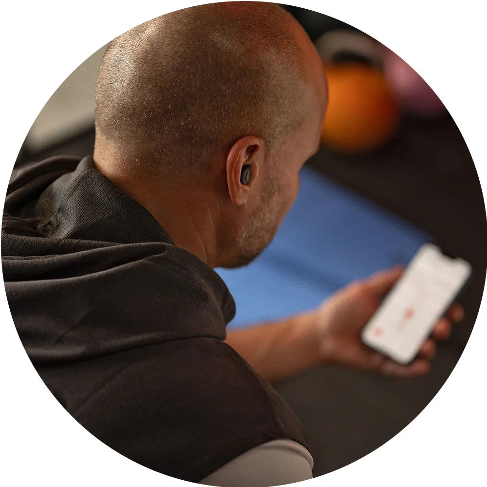 Person using a smartphone with a blurred background