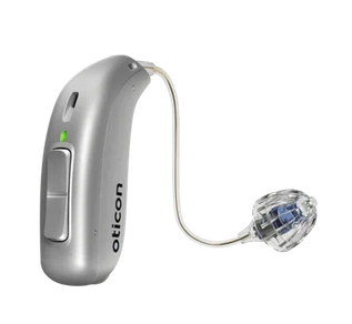 Silver Oticon hearing aid on a white background
