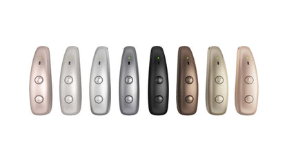 Eight Signia Pure Charge&Go MaX hearing aids in a row, showing every colour in the range.