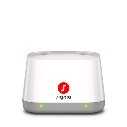 Signia Desktop Charger 2.0 for the Pure Charge&Go MaX, shown empty with its light on.