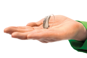 a hand holding the Injoy 8 affordable hearing aids
