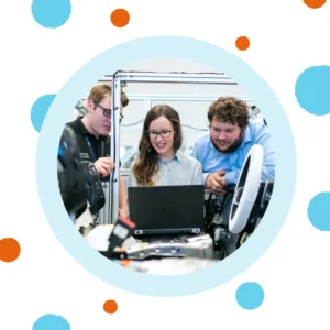 People work together in a lab. 