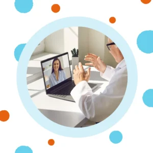 An audiologist talks to a patient online. 
