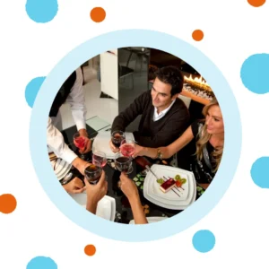 People enjoy dinner together at a restaurant. 