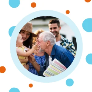 A grandfather talks to his grandchild. 