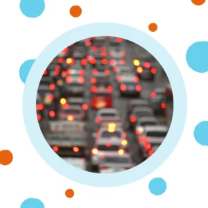 Many cars are stuck in traffic on a road. 