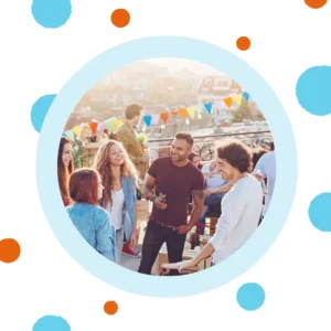 People attend an outdoor party. 