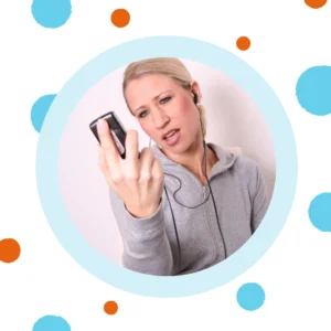 A woman is frustrated trying to talk on the phone.