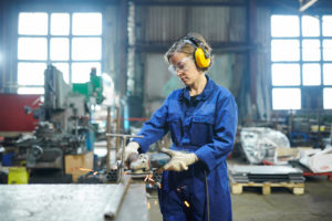 Woman Working in Garage