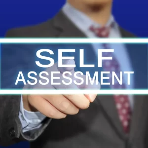 A man in a suit points at the reader with the words “self-assessment” superimposed on top.