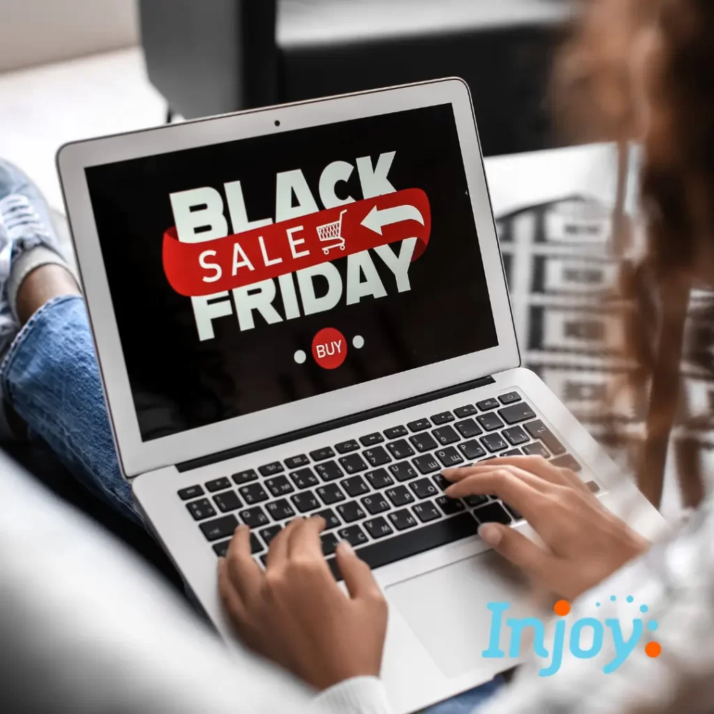 A laptop screen says, "Black Friday sales."