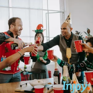 People enjoying an office holiday party. 