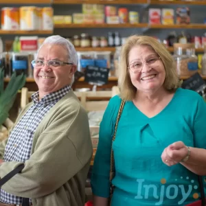 An older couple smiles at a store. 