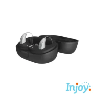 Starkey Genesis AI hearing aids sit in their charging case. 