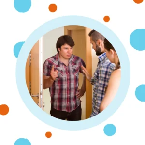 A man looks confused while talking to people.