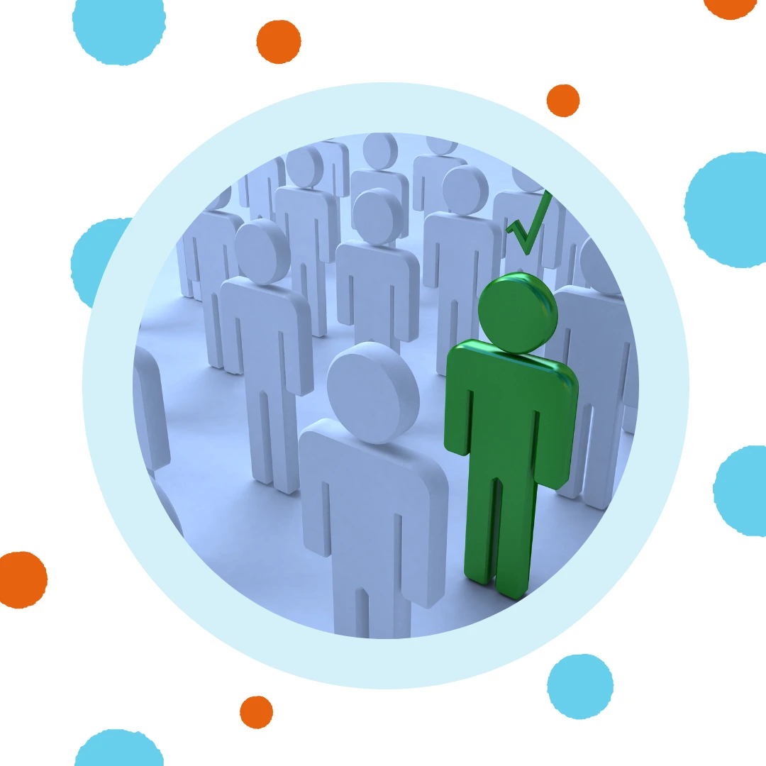 White stick people surround a green stick person with a check mark.