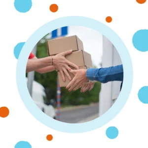 A delivery person hands boxes to someone. 