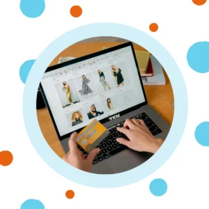 A person shops on their laptop. 