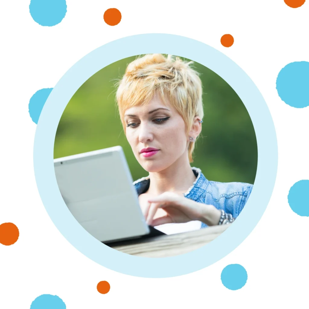 A woman shops on her laptop.