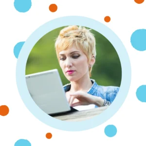 A woman shops on her laptop. 