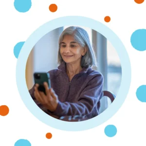 An older woman speaks on the phone. 