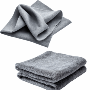 Gray cleaning cloths sit on a white background. 