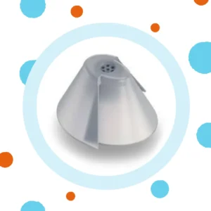 A hearing aid dome sits on a white background. 