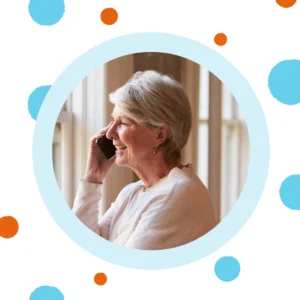 A woman talks on the phone. 