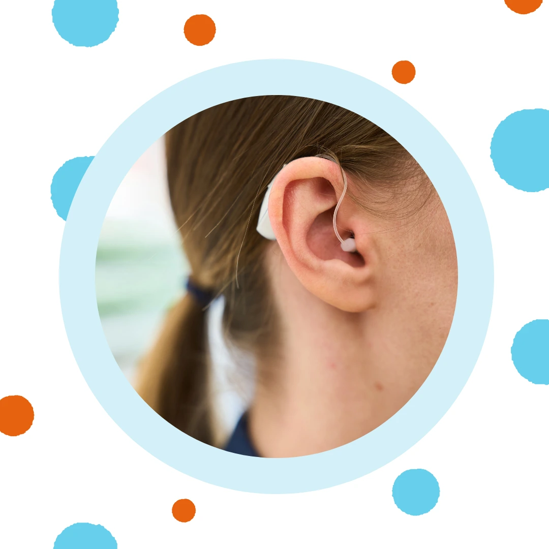 An ear has a RIC hearing aid in it.