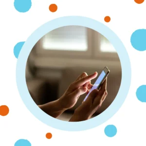 Hands use a cell phone. 