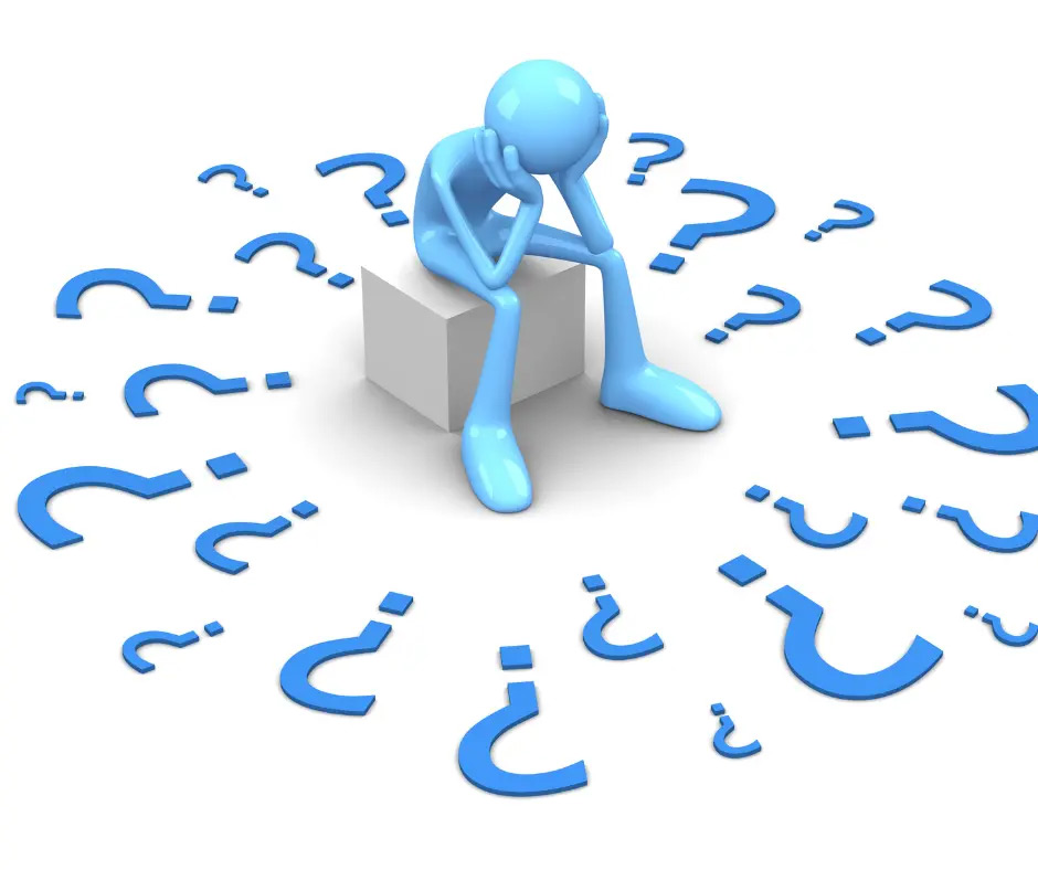 A blue figure sits with its head in its hands, surrounded by question marks.
